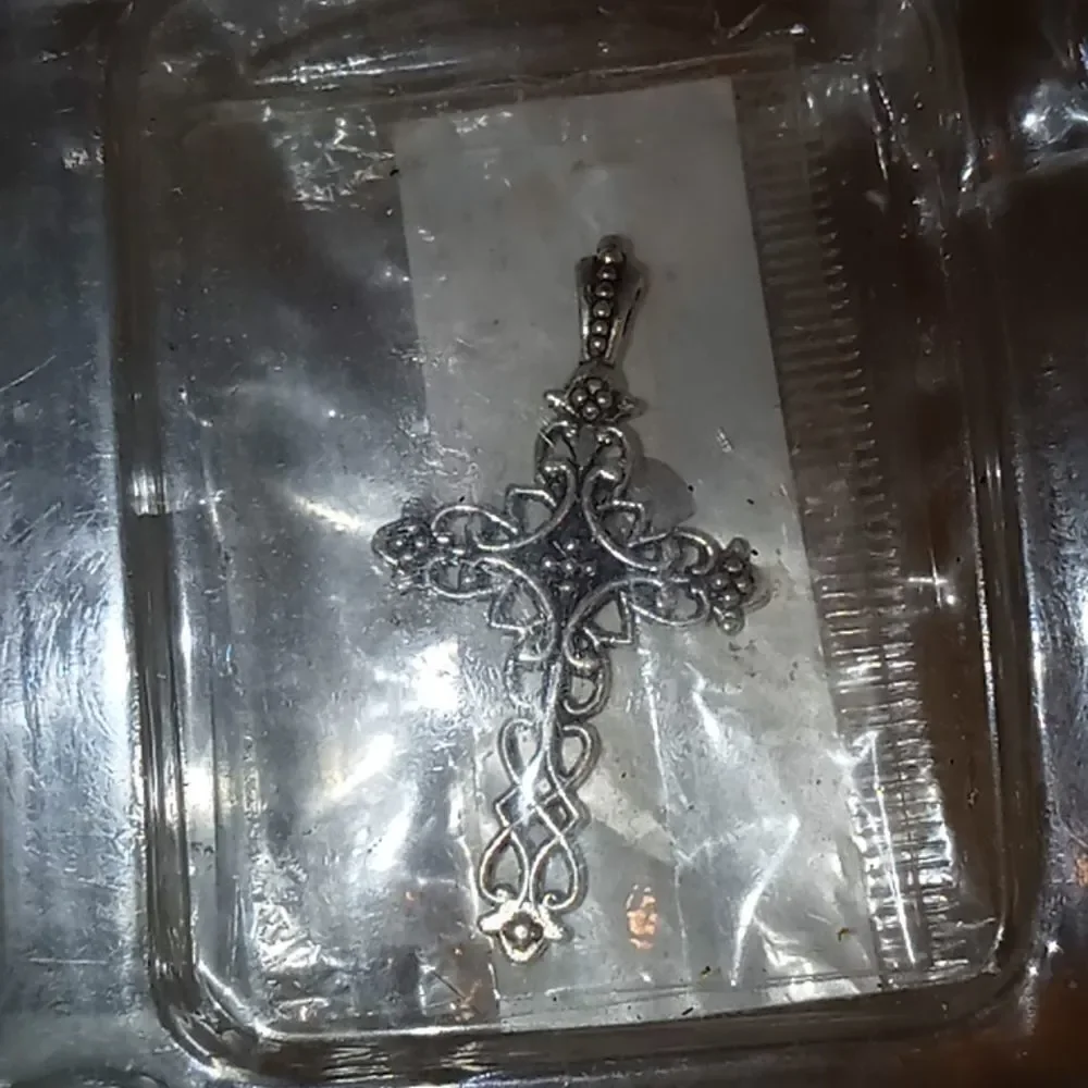1 gold bracelet with cross charm